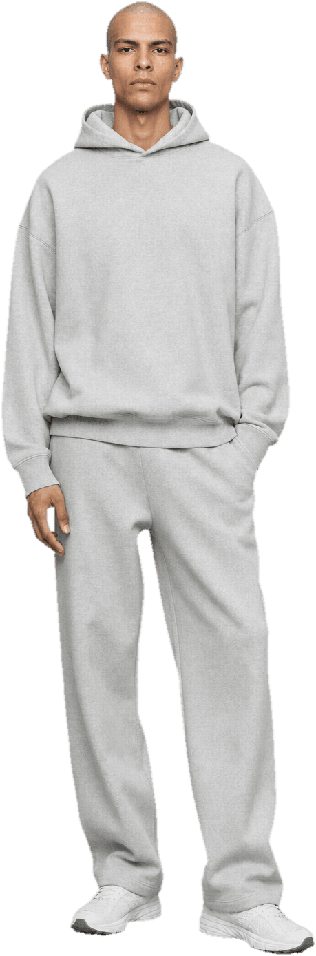 An oversized grey marl track set, hoodie and matching straight sweatpants, with chunky white running sneakers