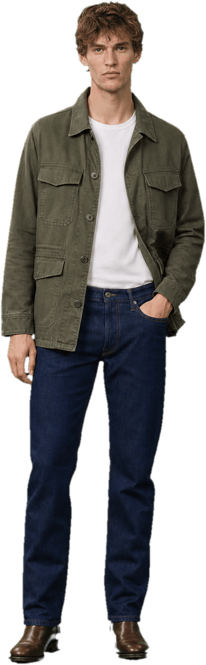 A washed olive cotton utility jacket over a plain white tee, straight-cut indigo jeans and brown leather boots
